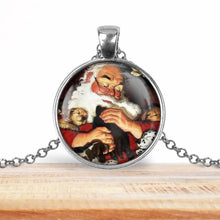 Load image into Gallery viewer, Santa Claus Snuggling Pendant Necklace
