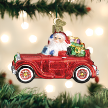 Load image into Gallery viewer, Santa In Antique Car Ornament
